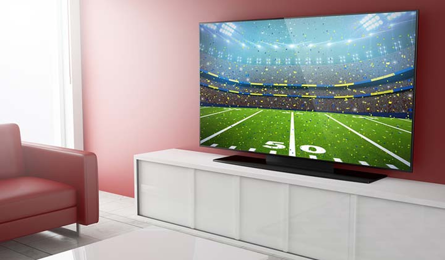 Large TV showing a football field