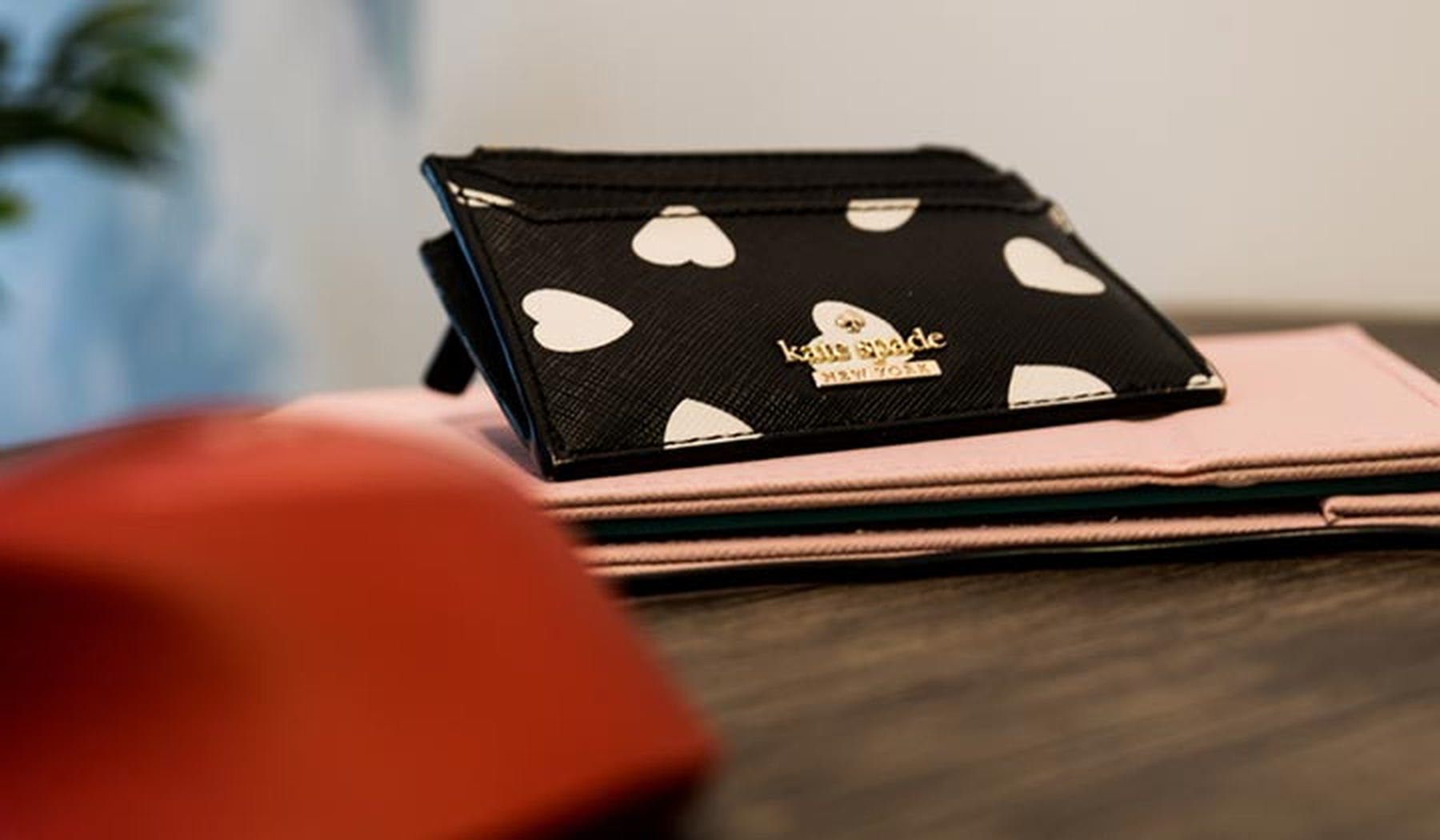 Kate Spade wallet in black leather with white hearts