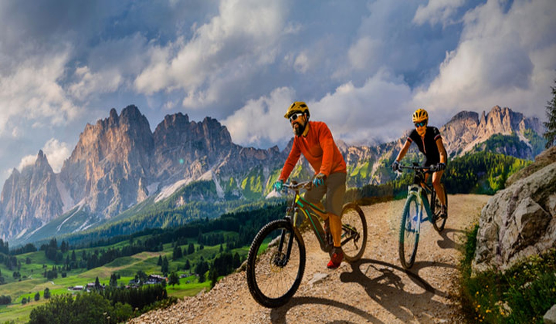 Two mountain bikers on a trail