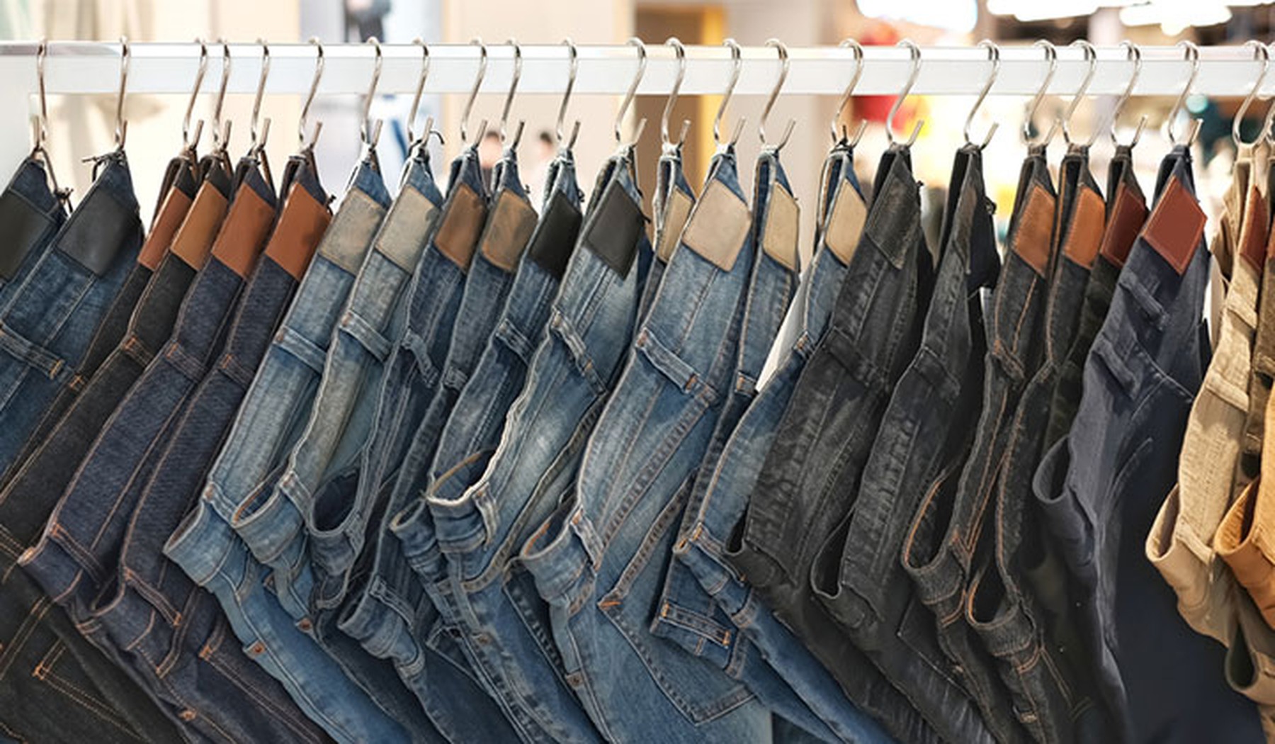 Row of hanging jeans