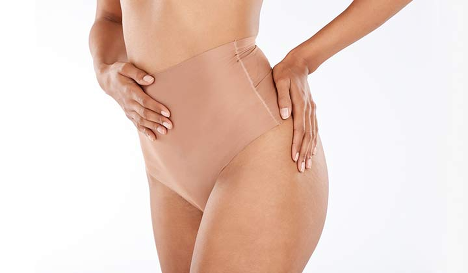 Woman wearing Spanx support underwear