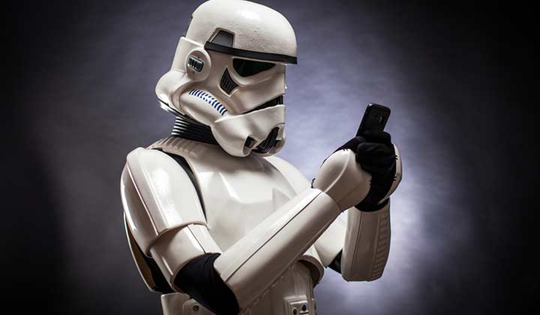 Stormtrooper holding a cell phone