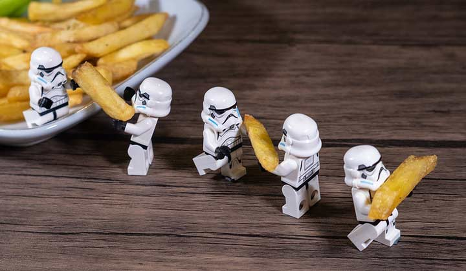 Stormtrooper figures carrying french fries