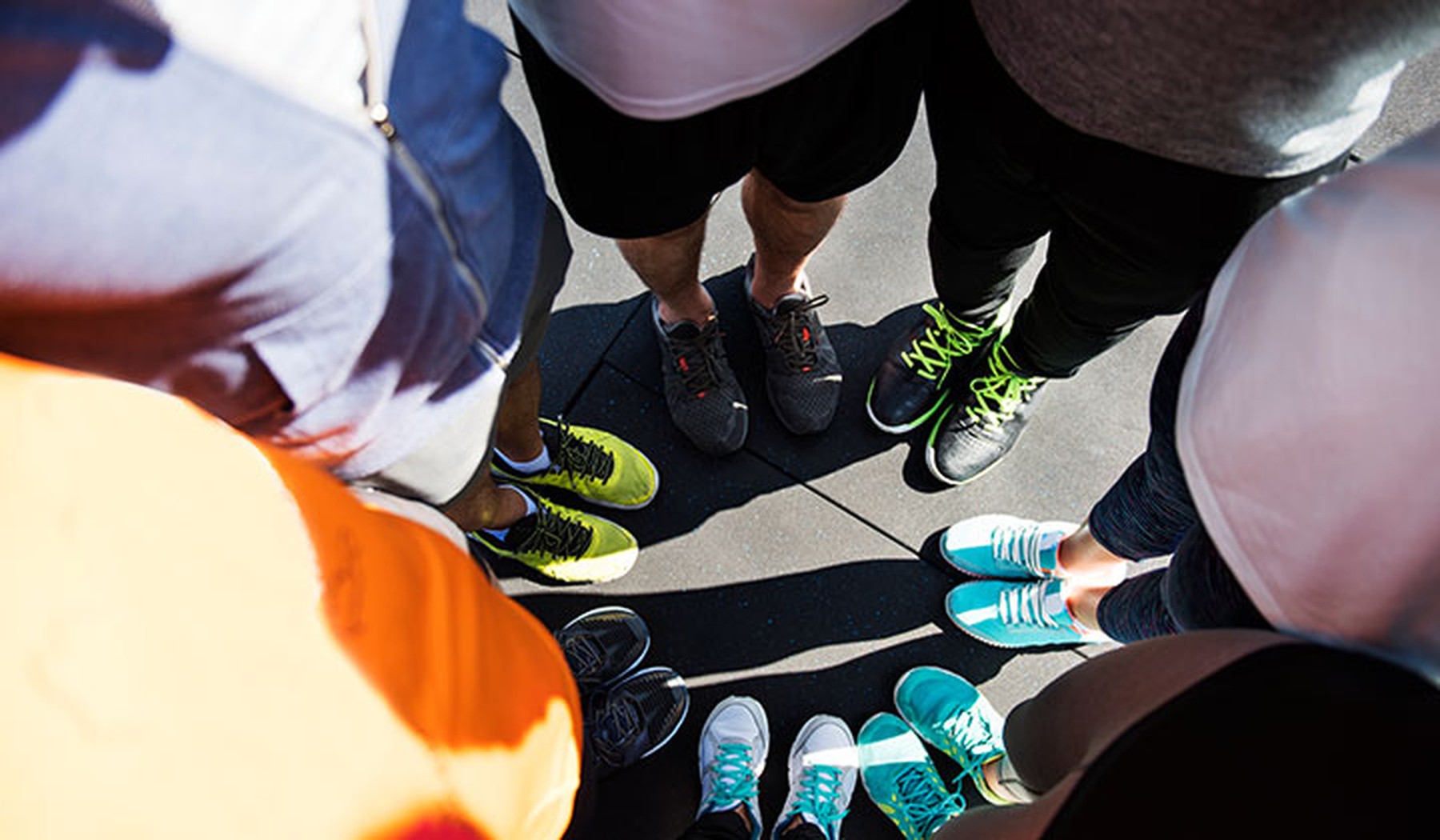 Group of people wearing athletic shoes
