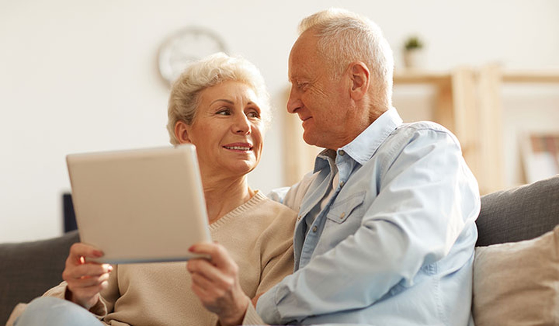 Older couple using a tablet together