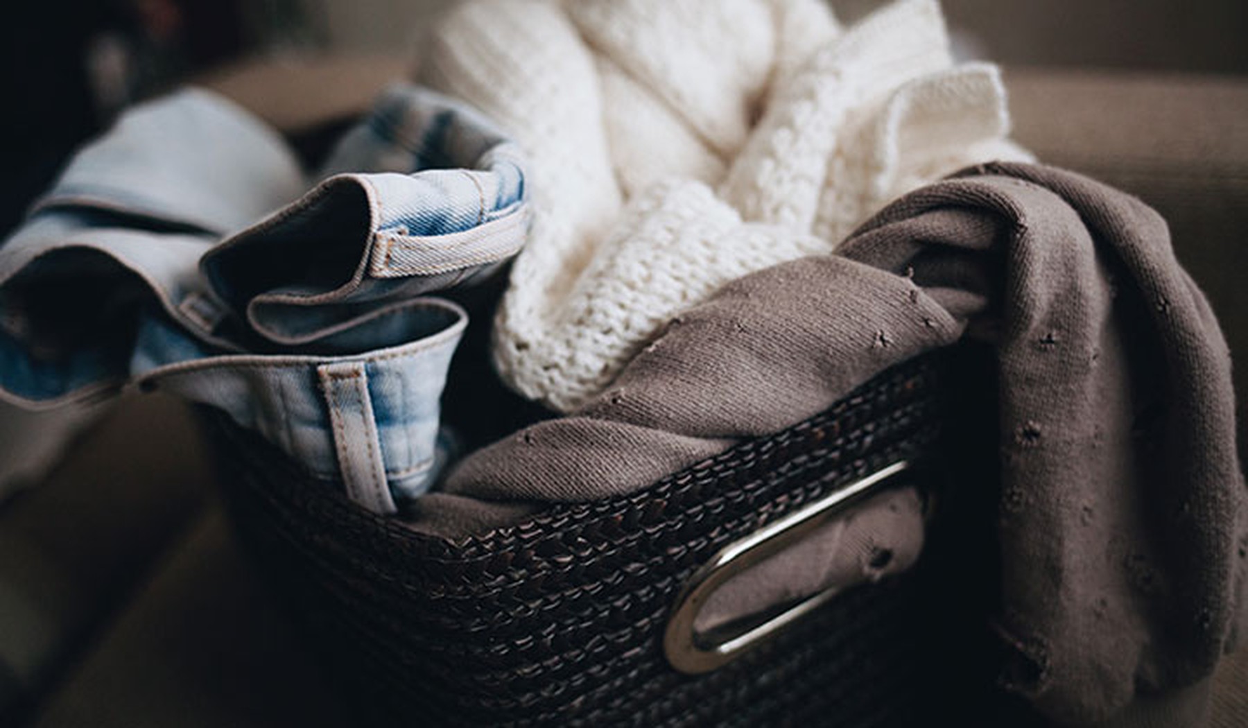 Worn out clothes in a basket